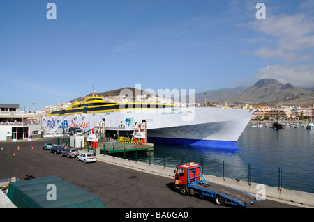 Fred Olsen Express passenger and vehicle inter island ferry at Los Cristianos port southern Tenerife Canary Islands Stock Photo