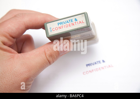 Private confidential stamp on a white studio background. Stock Photo