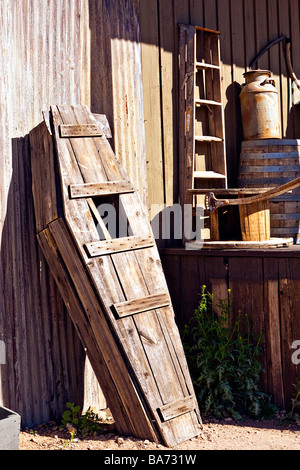 Image of an old wooden casket standing up against the outside of a building in Old Tucson Arizona Stock Photo