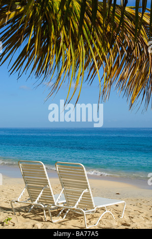 Beach chairs on Grand Anse Beach Grenada Stock Photo