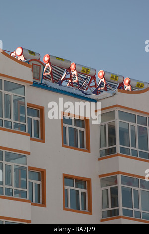 Modern apartment blocks with solar water heaters on the roof in Heilongjiang province in northern China Stock Photo