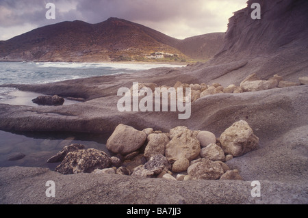 Rocky beach, Bay near Agua Amarga, Cala del Plomo, Parque Natural Cabo de Gata, Andalusia, Spain Stock Photo