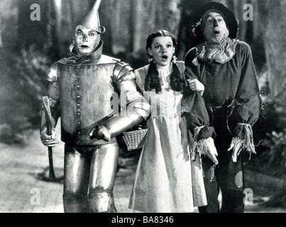 THE WIZARD OF OZ  1939 MGM film with from left Jack Haley as Tin Man, Judy Garland as Dorothy and  Ray Bolger as the Scarecrow Stock Photo