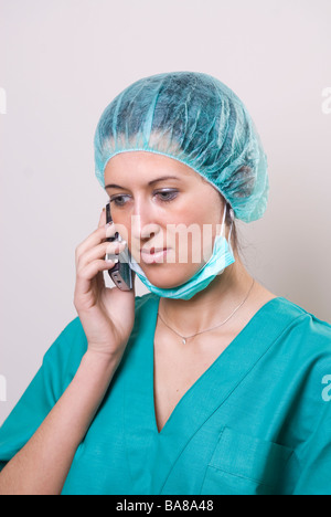Nurse talking on mobile phone Stock Photo