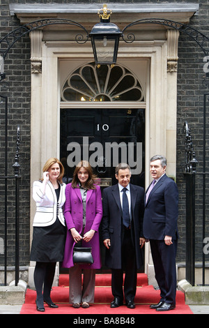 French President Nicolas Sarkozy and wife Carla Bruni Sarkozy with Prime Minister Gordon Brown and wife Sarah at Downing Street Stock Photo