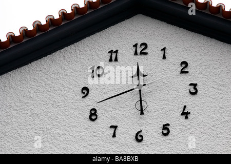 Close-up detail of a clock on a building in Madeira Stock Photo