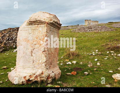 Roman Ruins of Acinipo, Malaga Province, Spain.  Ruins of Roman city also known as Ronda La Vieja. The theatre in background. Stock Photo