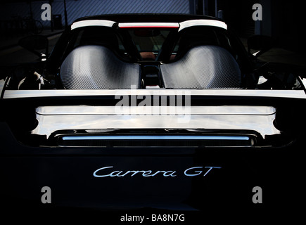 Rear view of the engine cover boot and spoiler of a black Porsche Carrera GT Stock Photo
