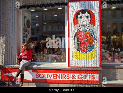 A women in front of souvenir shop, Arbat street, Moscow, Russia Stock Photo