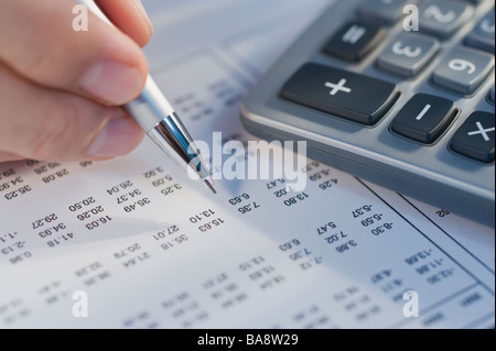 Man calculating numbers Stock Photo