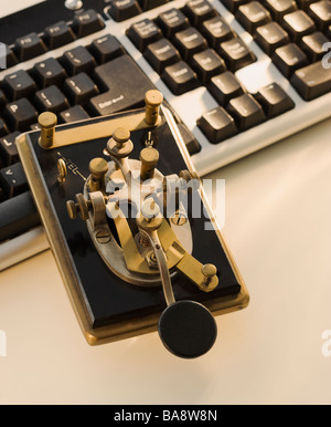 Antique telegraph key and keyboard Stock Photo