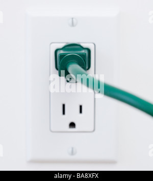 Close up of electric plug and wall outlet Stock Photo