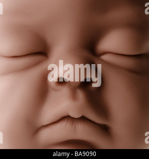 Close up of baby doll face Stock Photo