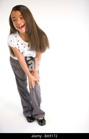 Portrait of cheerful African American girl, studio shot Stock Photo