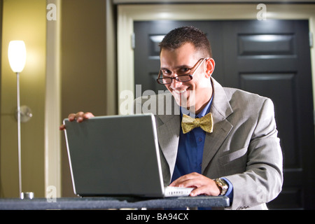 Young businessman working on laptop Stock Photo