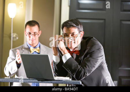 Businessmen working on laptop Stock Photo