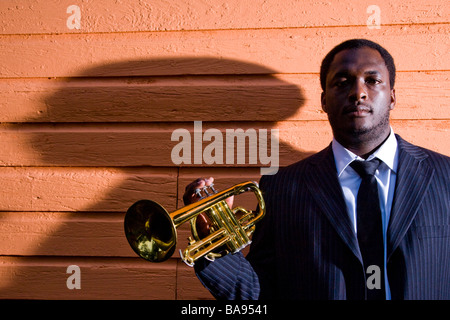 African-American musician holding a trumpet Stock Photo