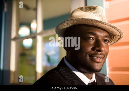 Portrait of African American man wearing fedora hat Stock Photo