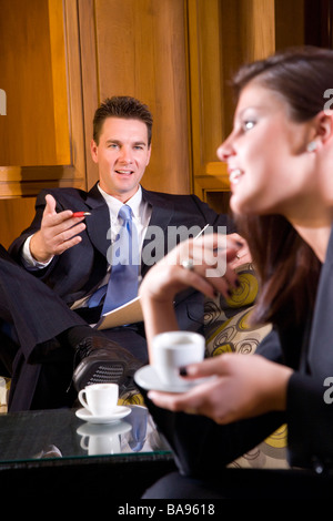 Business people meeting over cup of coffee Stock Photo