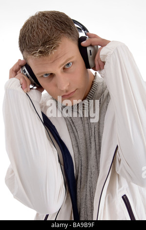 young man holding the headphone Stock Photo