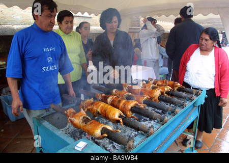 Guinea Pigs roasting on a charcoal grill in Cusco Peru Known locally as Cuy Stock Photo