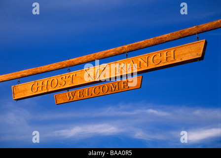 Evening light on the welcome sign at Georgia O'Keeffe's Ghost Ranch Abiquiu New Mexico Stock Photo