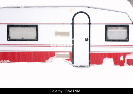 A caravan covered with snow Sweden Stock Photo