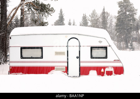 A caravan covered with snow Sweden Stock Photo