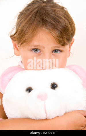 little girl with teddy bear Stock Photo