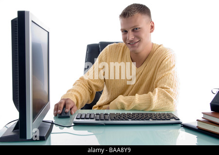 smiling man working on computer Stock Photo