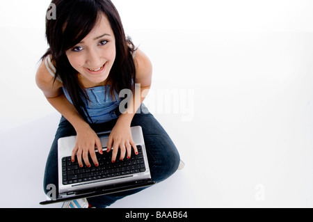 Beautiful and happy girl with a laptop, isolated on white Stock Photo ...