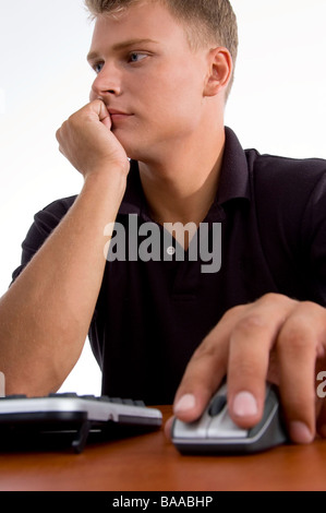 young professional working on computer Stock Photo