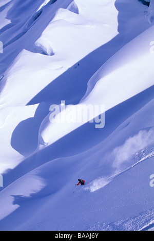 Woman big mountain skiing in Haines, Alaska. Stock Photo