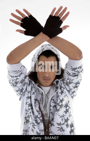 young fashionable guy posing with hand gesture Stock Photo
