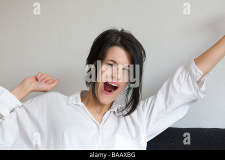 A gaping woman - Gähnende Frau Stock Photo