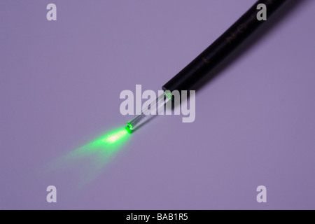 laser light passed through optical fibre cable Stock Photo