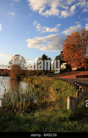 Hocking Hills with Lake Logan life living in Ohio USA  Autumn beautiful landscape with colorful leaves and rural road outside horizon  hi-res Stock Photo