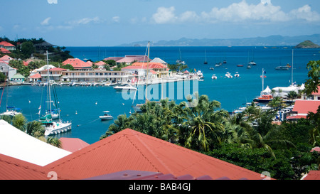 Red tin roof buildings surround Gustavia port St Barts Stock Photo