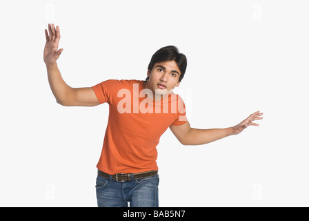 Portrait of a man looking surprised Stock Photo