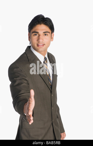 Businessman offering a handshake Stock Photo