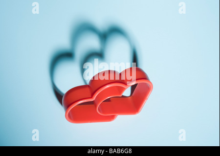Close-up of a red heart shaped cookie cutter Stock Photo