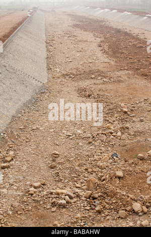 A dried up river bed in Northern China brought on by climate change Stock Photo