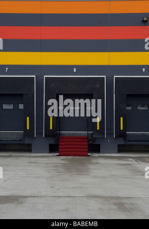 HGV loading ramp to production workshop with red carpet in delivery area of First Solar, Frankfurt, Germany Stock Photo