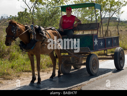 Cuban taxi service, a man with his horse and cart, in rural Matanzas Province on the north coast of Cuba Stock Photo