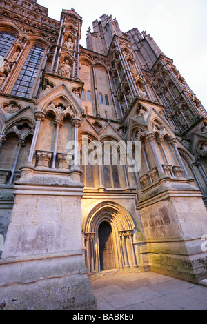 City of Wells, England. Close up angled dusk view of Wells Cathedral West Front entrance. Stock Photo