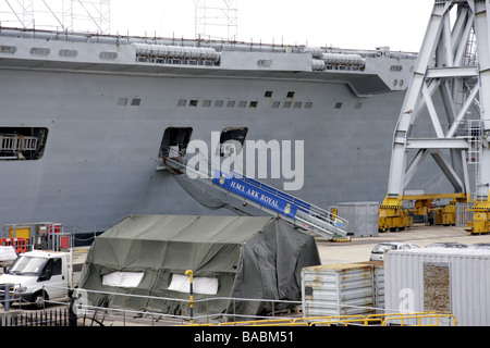 The gangplank up to HMS Ark Royal moored at the Royal Navy Dockyard in Portsmouth. Stock Photo
