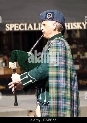 Scottish bagpipe performer in the city of Edinburgh Scotland