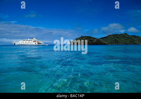 France, French Polynesia, Tia Moana Yacht sailing off of the island of Huahine Stock Photo