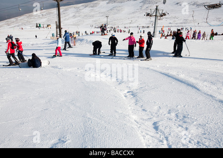 Skiers on Cairngorm in the Cairngorm National Park in Scotland UK Stock Photo
