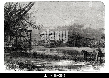 building of the kensington hammersmith and richmond railway bridge at kew River Thames Joseph Locke cast iron bridge 1867 Stock Photo